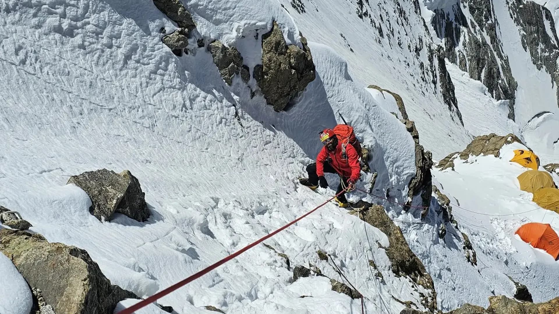 Climbing a fixed line between high camps in the Karakoram