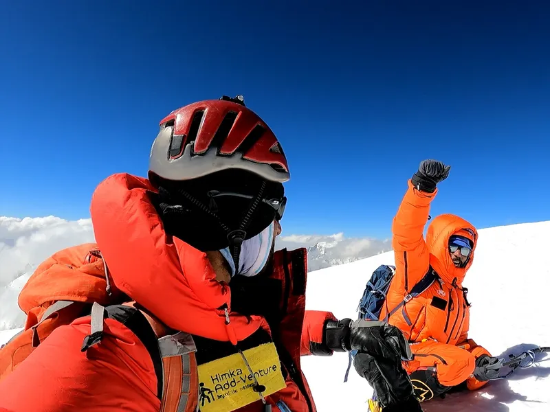 Sirbaz Khan and Abid Baig on the summit of Terich Mir, the highest peak of the Hindu Kush